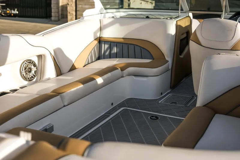 Slide: The Image of Luxurious interior of 2021 MB B23 Alpha boat with tan and white seating. - 14
