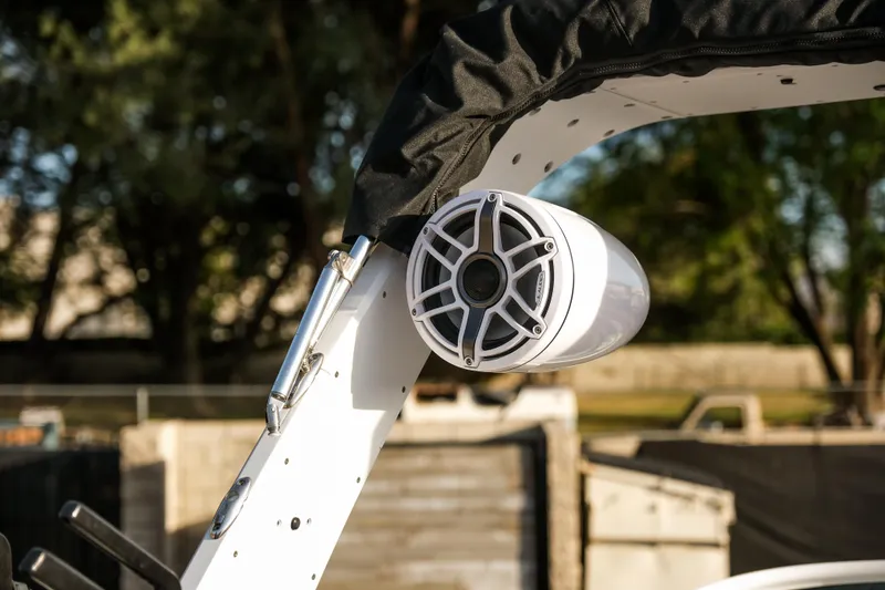 Slide: The Image of 2021 MB B23 Alpha boat speaker mounted on a white frame, outdoors. - 20