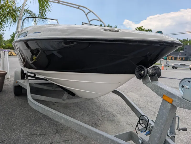 Slide: The Image of 2004 Yamaha Boats AR230 HO on trailer, parked outdoors. - 4