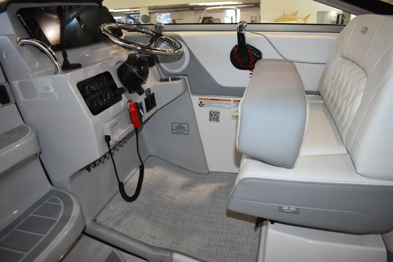 Slide: The Image of 2026 Regal 26 XO boat interior with modern helm and seating. - 22