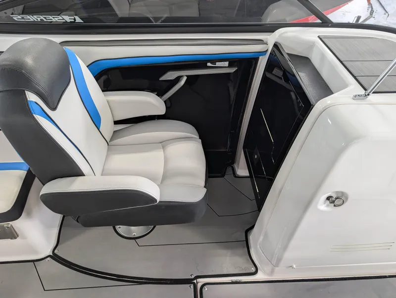 Slide: The Image of 2019 Yamaha Boats 242X E-Series interior with sleek seating and modern design. - 16