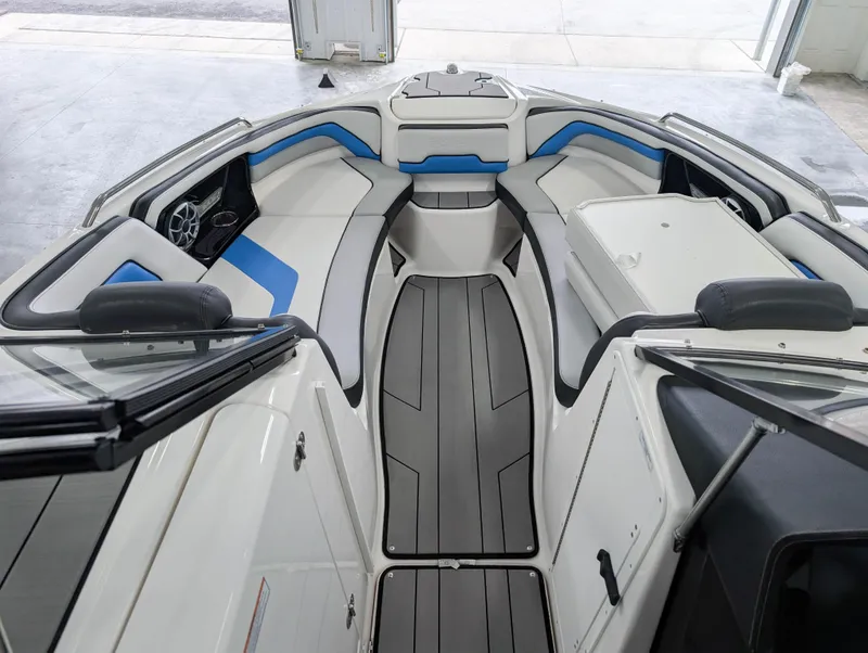 Slide: The Image of 2019 Yamaha Boats 242X E-Series interior with sleek seating and modern design. - 21