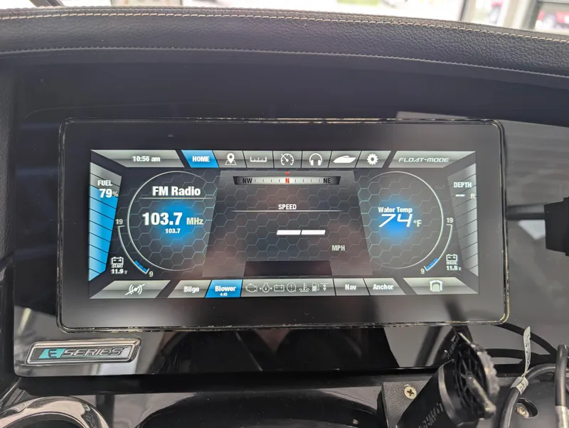 Slide: The Image of Yamaha Boats 2019 242X E-Series dashboard displaying FM radio and water temperature. - 30