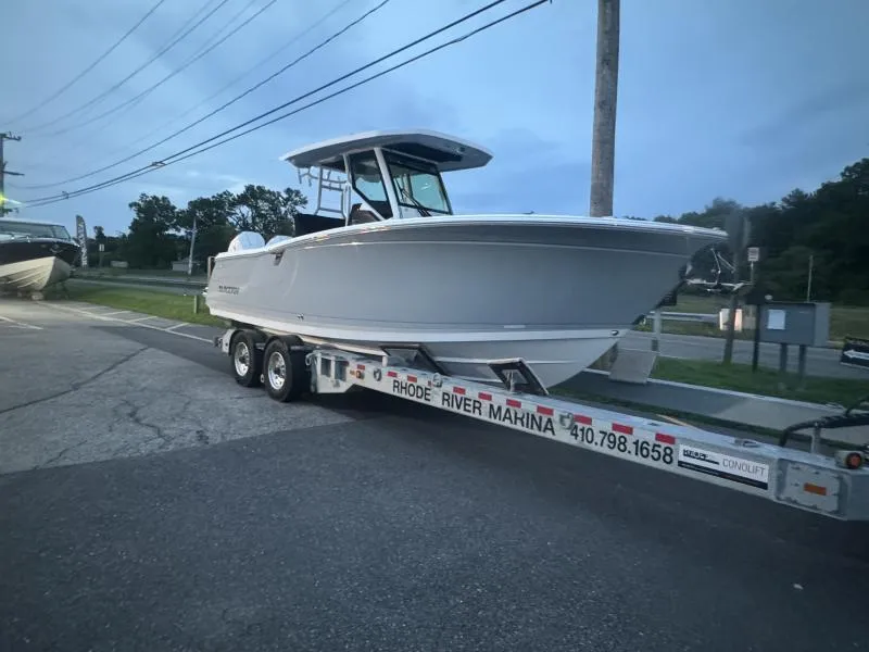 Slide: The Image of 2025 Blackfin 272 CC boat on trailer at Rhode River Marina. - 4