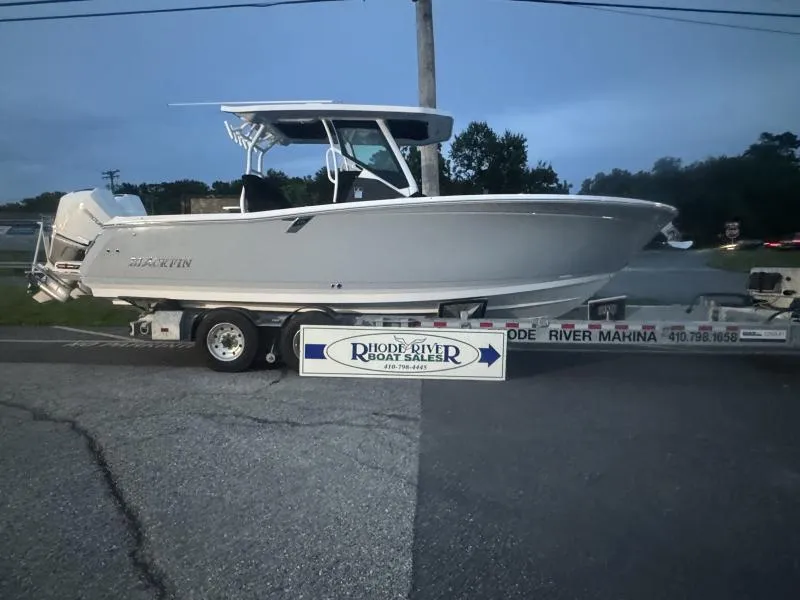 Slide: The Image of 2025 Blackfin 272 CC boat on trailer at Rhode River Boat Sales. - 6