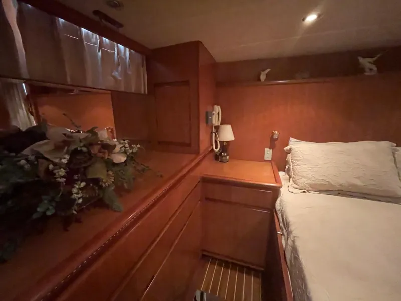 Slide: The Image of Luxurious cabin interior of 2005 Novatec 48 Cockpit Motor Yacht with elegant wood finish. - 37