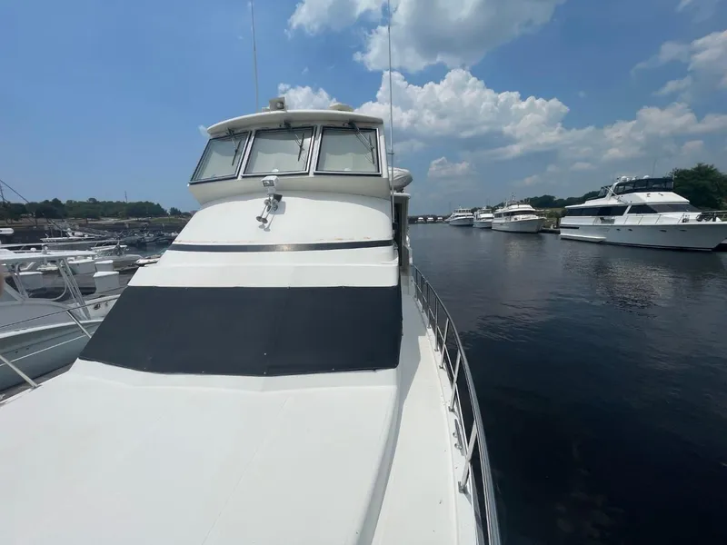 Slide: The Image of 2005 Novatec 48 Cockpit Motor Yacht docked on a sunny day. - 5