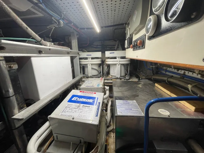 Slide: The Image of Engine room of 2005 Novatec 48 Cockpit Motor Yacht with mechanical equipment and gauges. - 55