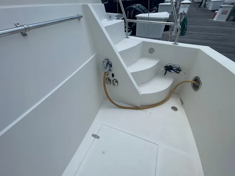 Slide: The Image of 2005 Novatec 48 Cockpit Motor Yacht deck with steps and railing. - 6