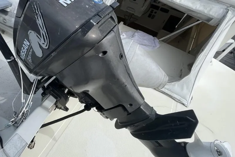 Slide: The Image of Outboard motor on 2005 Novatec 48 Cockpit Motor Yacht deck, featuring Nissan branding. - 69