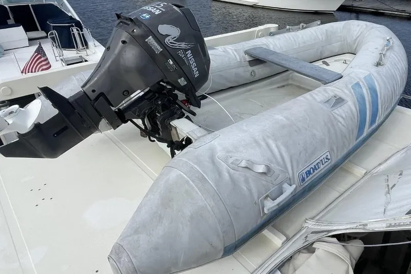 Slide: The Image of Inflatable boat with Nissan outboard motor on 2005 Novatec 48 Cockpit Motor Yacht. - 70