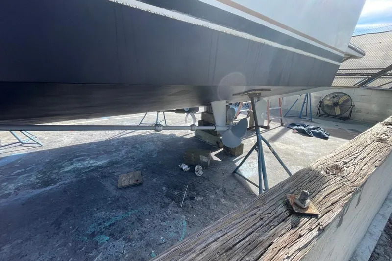 Slide: The Image of 2005 Novatec 48 Cockpit Motor Yacht on dry dock, showing propeller and hull. - 72