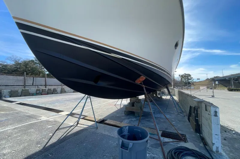 Slide: The Image of 2005 Novatec 48 Cockpit Motor Yacht on dry dock for maintenance. - 74