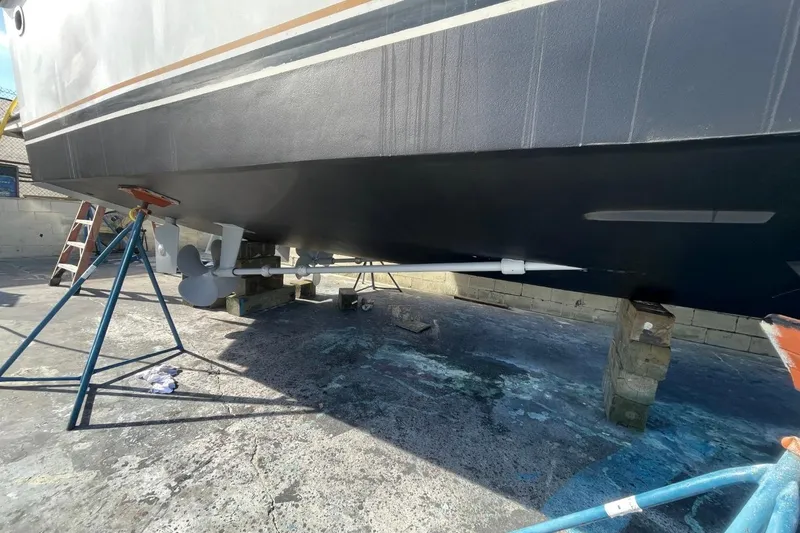 Slide: The Image of 2005 Novatec 48 Cockpit Motor Yacht hull and propellers on dry dock. - 78