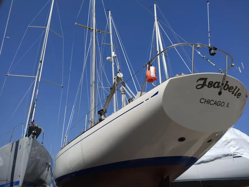 Slide: The Image of 1969 Chris-Craft Apache 37 sailboat "Isabelle" docked in Chicago, IL under clear blue sky. - 5