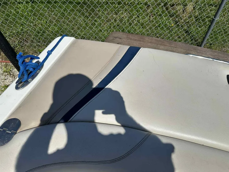 Slide: The Image of 1999 Malibu 20 Response LX boat interior with blue rope and shadow. - 10