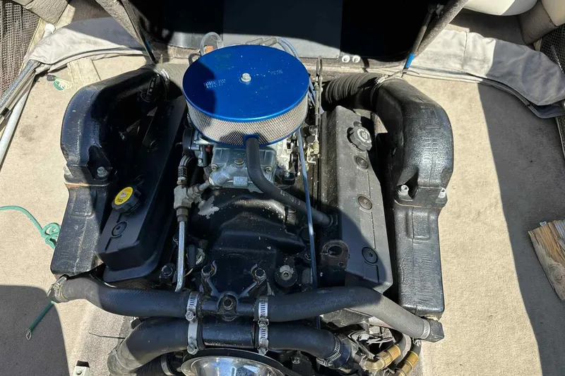 Slide: The Image of 1999 Malibu 20 Response LX engine with blue air filter, detailed view. - 15