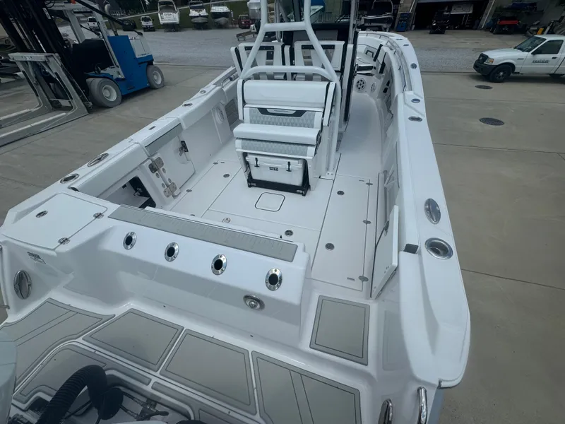 Slide: The Image of 2025 Blackfin 302 CC center console boat, spacious deck, modern design. - 13
