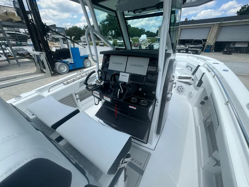 Slide: The Image of 2025 Blackfin 302 CC center console boat with Garmin navigation system. - 17