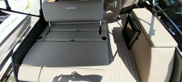 Slide: The Image of 2024 Sylvan Mirage 8520 CLZ DH boat interior with comfortable seating and modern design. - 10