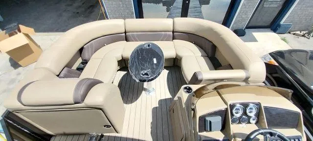 Slide: The Image of 2024 Sylvan Mirage 8520 CLZ DH pontoon boat with spacious seating and modern dashboard. - 5