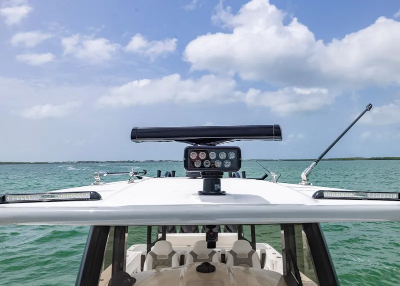 Slide: The Image of 2026 Blackwater 41 Sportfish boat on open water under blue sky. - 10