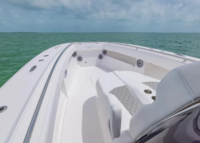 Slide: The Image of 2026 Blackwater 41 Sportfish boat on open water, featuring sleek white seating and modern design. - 11