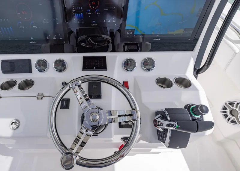 Slide: The Image of 2026 Blackwater 41 Sportfish helm with advanced navigation displays and controls. - 13