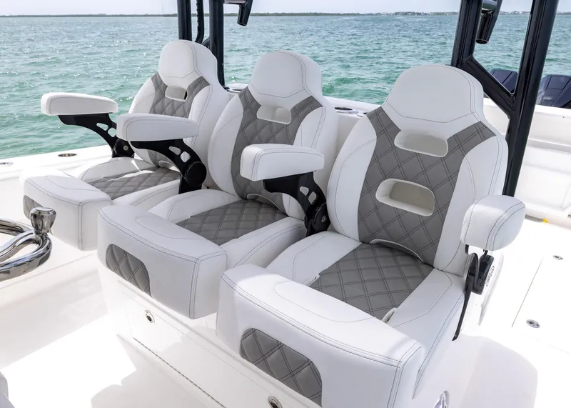Slide: The Image of Luxury seating on 2026 Blackwater 41 Sportfish boat, featuring elegant design and ocean backdrop. - 17