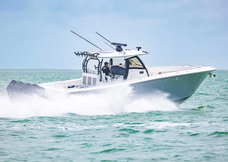 Slide: The Image of 2026 Blackwater 41 Sportfish boat cruising on open water. - 2