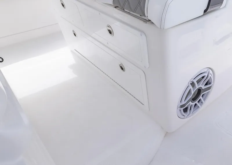 Slide: The Image of Interior of 2026 Blackwater 41 Sportfish boat, featuring seating and speaker. - 20