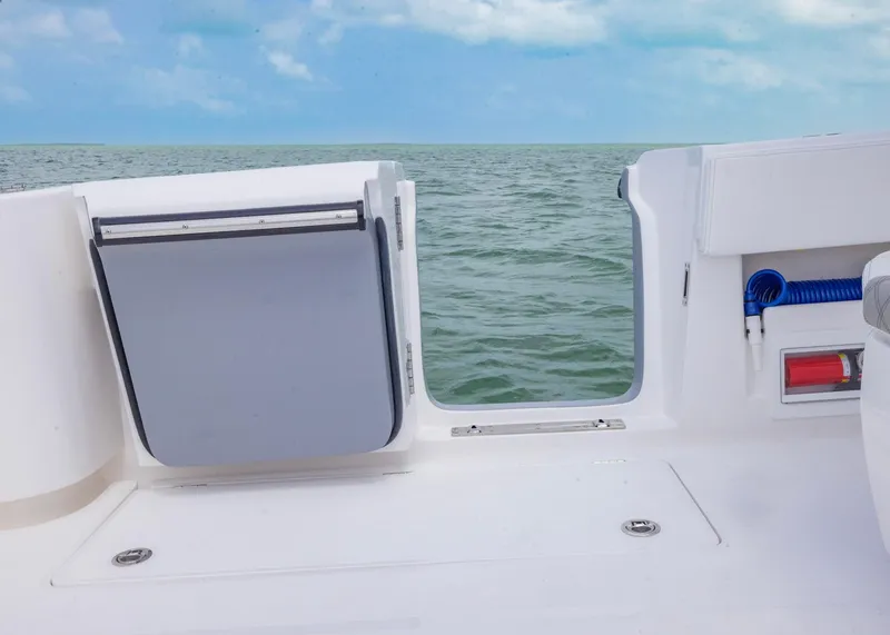 Slide: The Image of 2026 Blackwater 41 Sportfish boat deck with ocean view and blue sky. - 21
