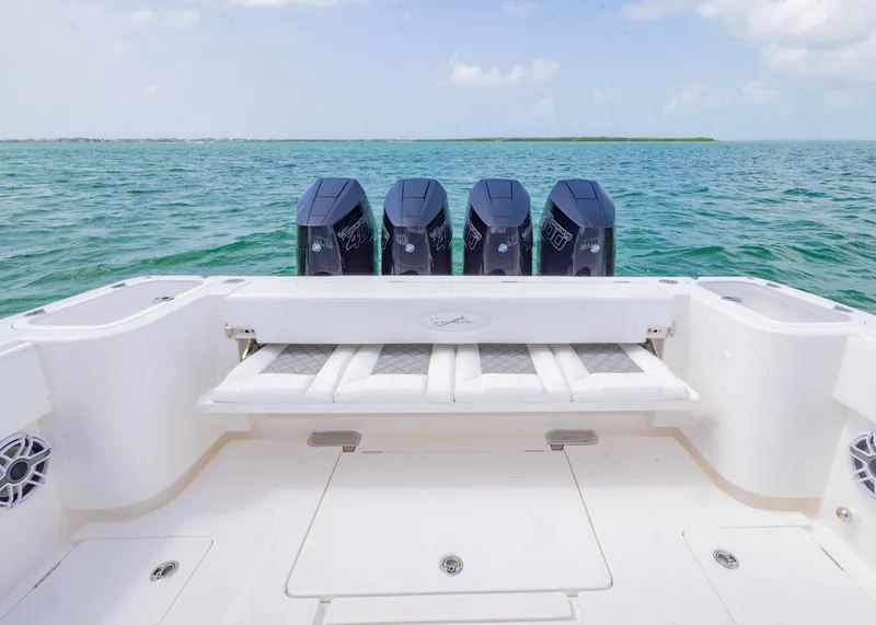 Slide: The Image of 2026 Blackwater 41 Sportfish boat with four powerful engines on open water. - 23