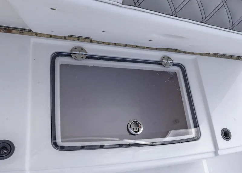 Slide: The Image of Hinged compartment on 2026 Blackwater 41 Sportfish boat, featuring a secure latch and sleek design. - 34