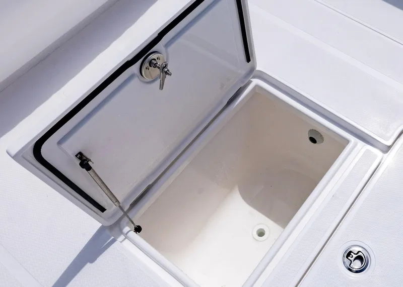 Slide: The Image of Open storage compartment on 2026 Blackwater 41 Sportfish boat deck. - 36