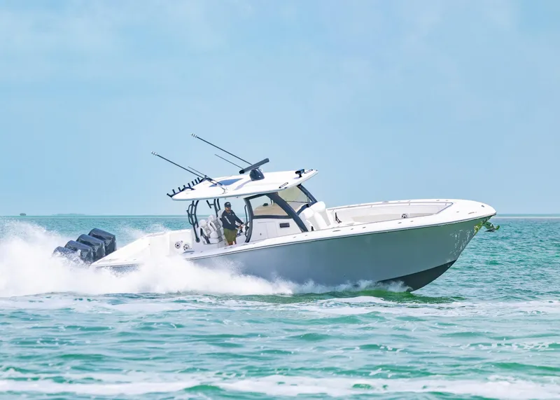 Slide: The Image of 2026 Blackwater 41 Sportfish cruising on open water, showcasing speed and performance. - 46