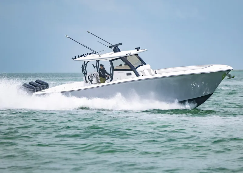 Slide: The Image of 2026 Blackwater 41 Sportfish boat cruising on open water. - 48