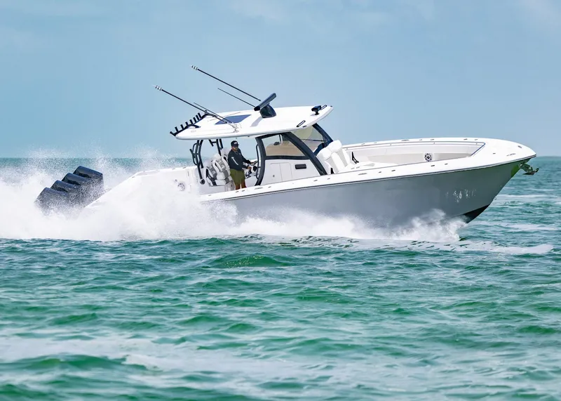 Slide: The Image of 2026 Blackwater 41 Sportfish boat cruising on open water. - 49