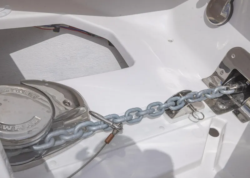 Slide: The Image of Anchor chain mechanism on 2026 Blackwater 41 Sportfish boat, featuring polished metal components. - 7