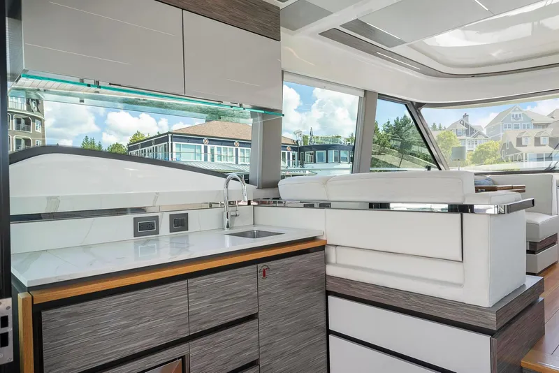 Slide: The Image of Modern interior of 2022 Tiara Yachts C49 Coupe with sleek kitchen design. - 28