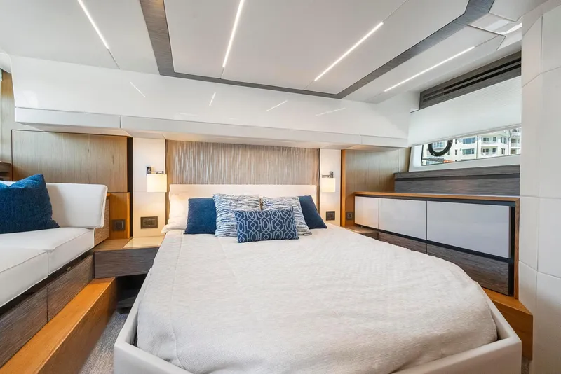 Slide: The Image of Luxurious bedroom interior of 2022 Tiara Yachts C49 Coupe with modern design and cozy bedding. - 39