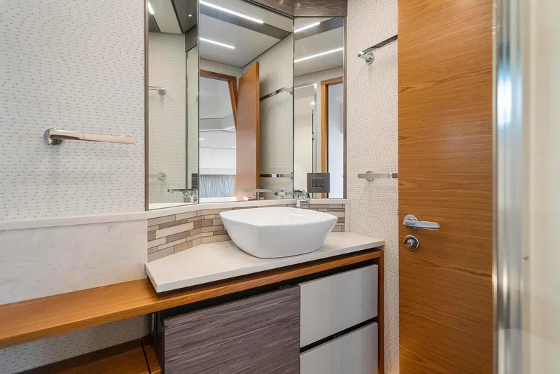 Slide: The Image of Modern bathroom in 2022 Tiara Yachts C49 Coupe, featuring sleek design and elegant fixtures. - 45