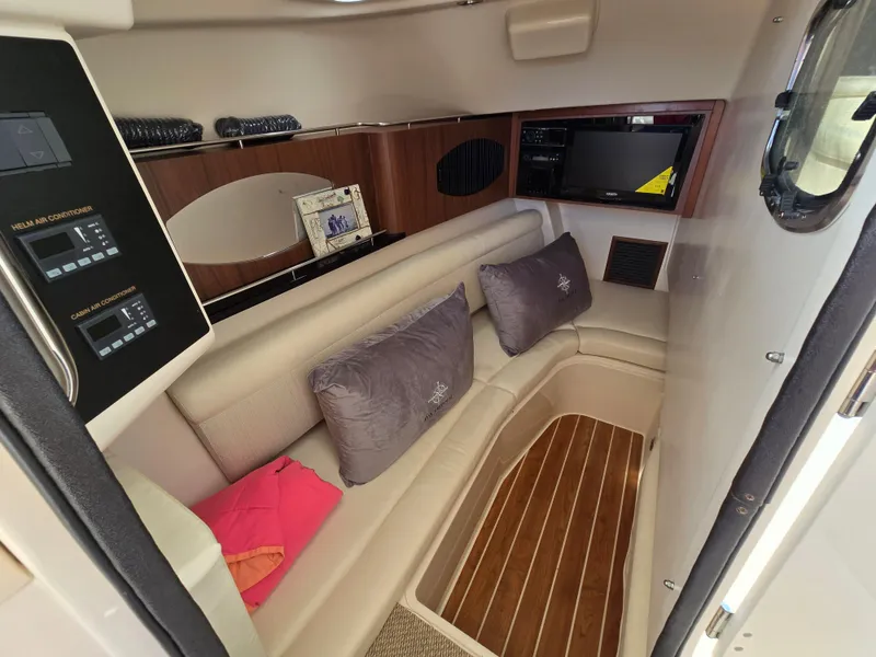 Slide: The Image of Interior of 2017 Grady-White Freedom 335 boat with seating and control panels. - 15