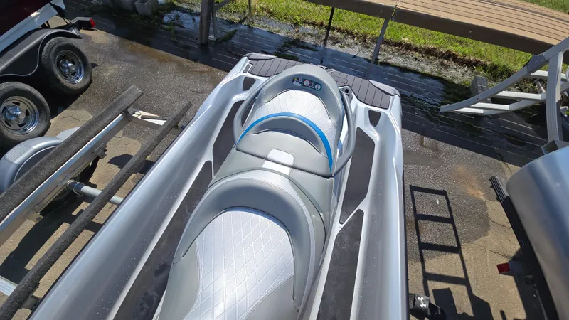 Slide: The Image of 2021 Sea-Doo GTX Limited 300 jet ski with sleek silver design and comfortable seating. - 11