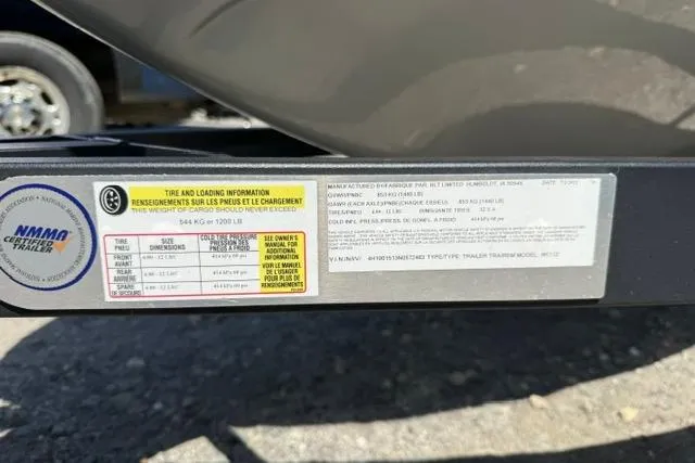Slide: The Image of 2021 Sea-Doo GTX Limited 300 trailer label showing tire and loading information. - 18