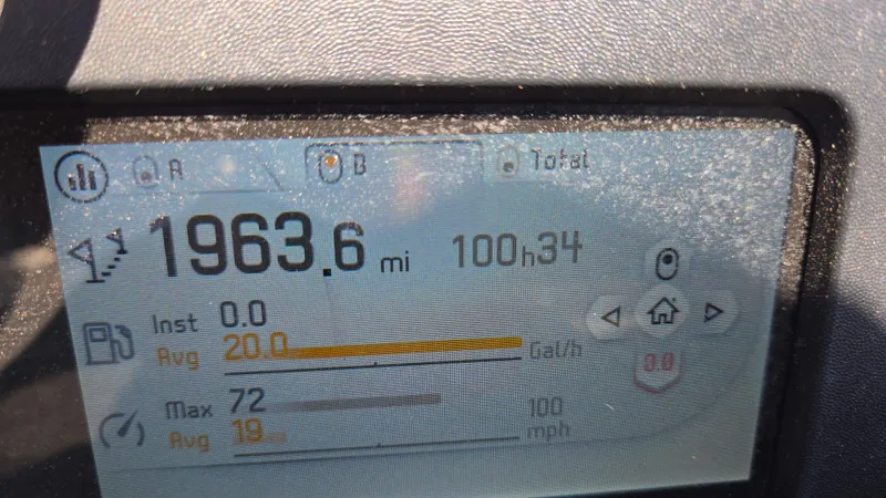 Slide: The Image of Dashboard display of a 2021 Sea-Doo GTX Limited 300 showing mileage and fuel statistics. - 9