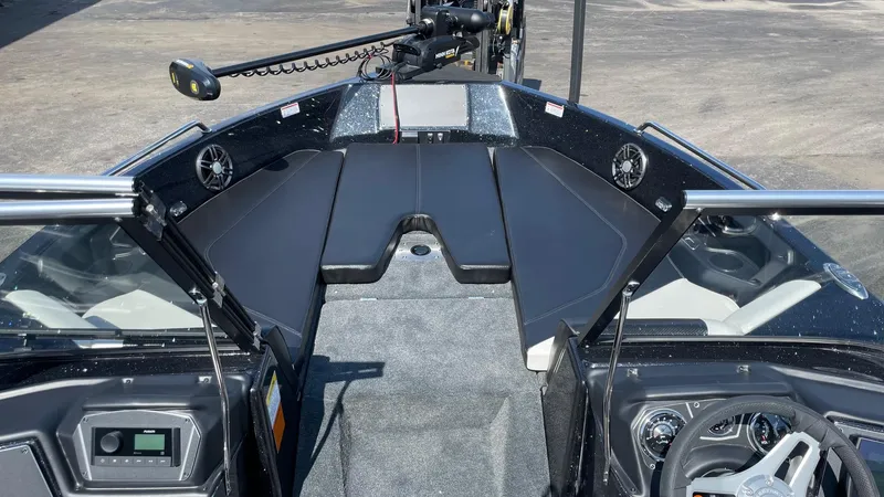Slide: The Image of 2025 Skeeter Solera 205 boat interior with modern dashboard and seating. - 5