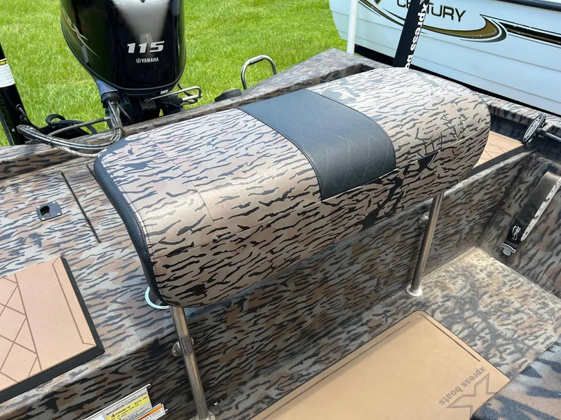 Slide: The Image of 2022 Xpress H190B boat interior with camo seating and Yamaha 115 engine. - 9