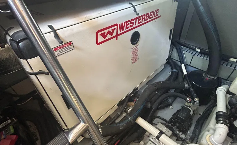 Slide: The Image of Engine room of 2002 Sea Ray 480 Motor Yacht with Westerbeke generator. - 29