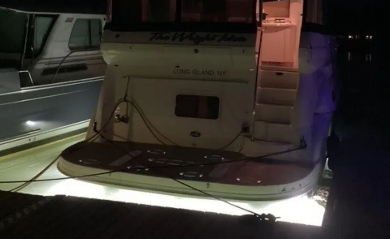 Slide: The Image of 2002 Sea Ray 480 Motor Yacht docked at night, Long Island, NY. - 32